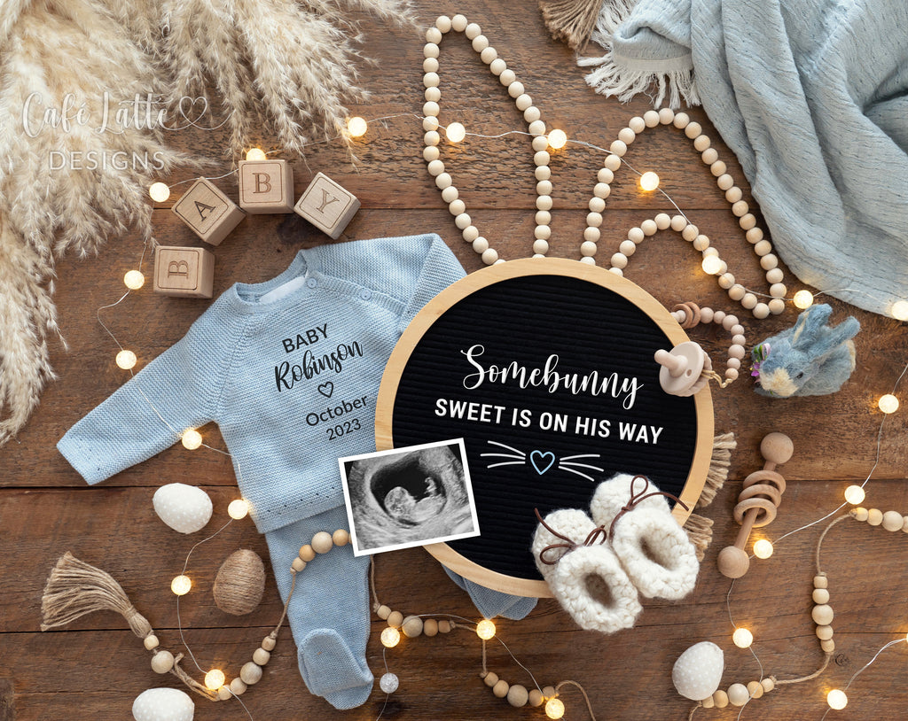 Easter boy baby gender reveal for social media, Easter boy pregnancy announcement digital image with bunny ears, pampas, Easter eggs, blue knit outfit and circle letter board, somebunny sweet is on his way, its a boy